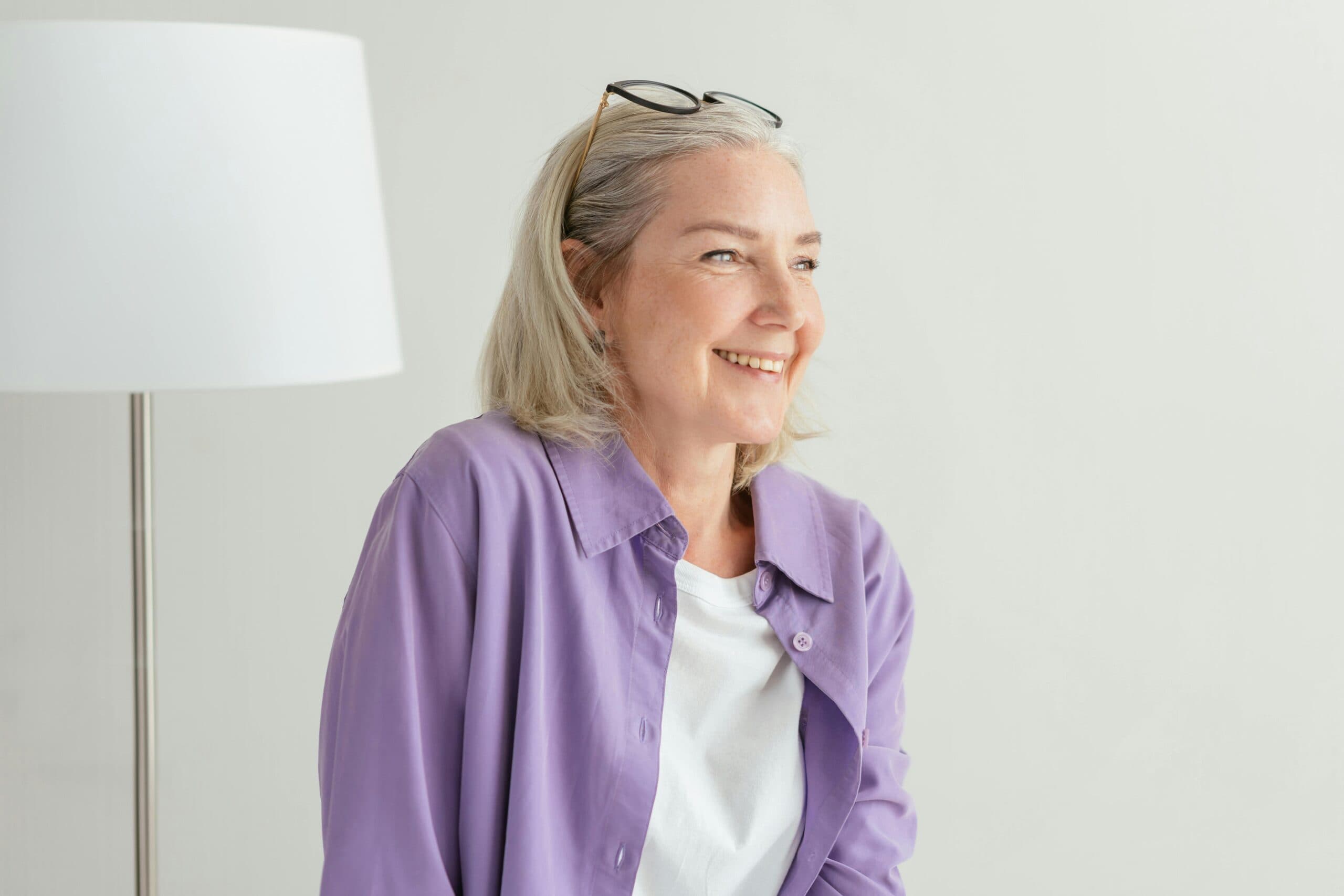 Woman smiling confidently after a smile makeover at J. Ladd Williams Cosmetic Dentistry in Mesa, AZ
