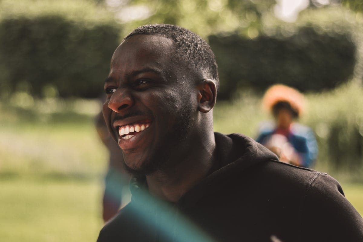 Man smiling confidently with dental implants in Mesa, AZ