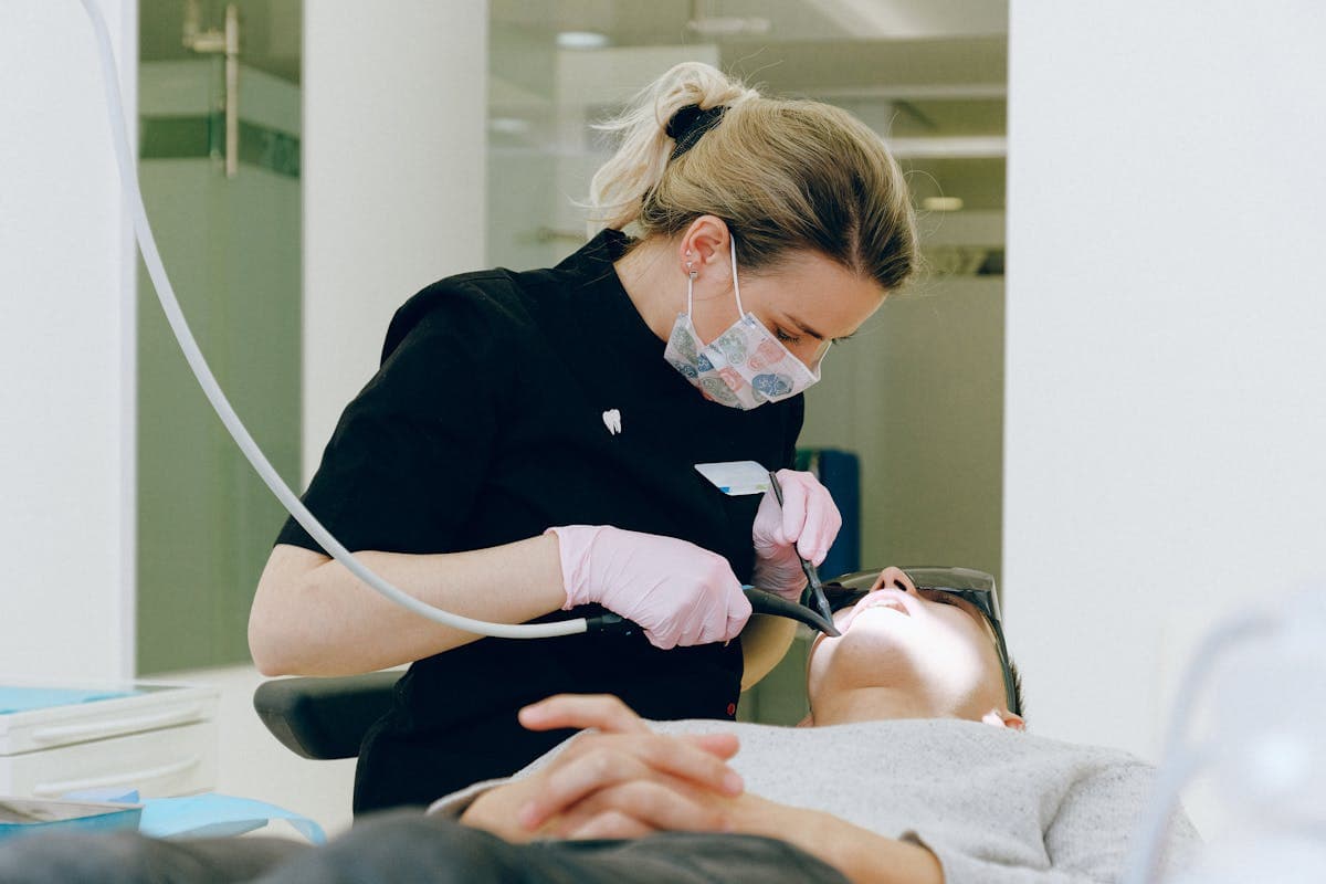 Person experiencing persistent TMJ jaw pain despite wearing a night guard